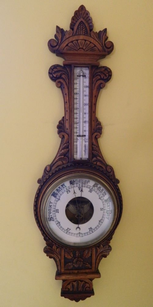 large carved oak aneroid barometer
