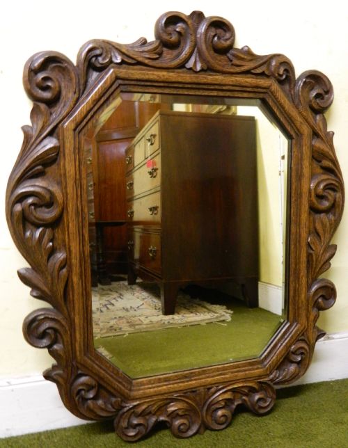 large carved oak wall mirror