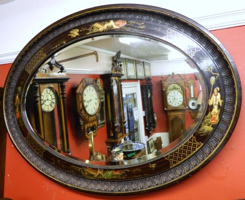 large oval chinoiserie wall mirror