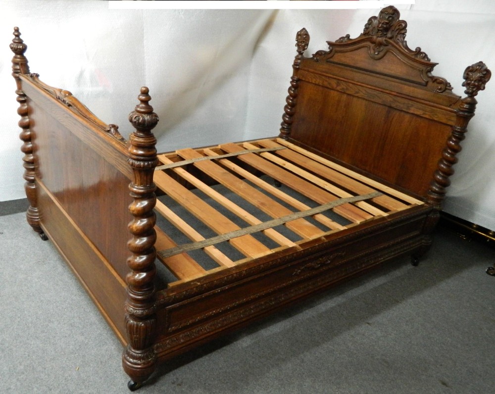 carved oak bed