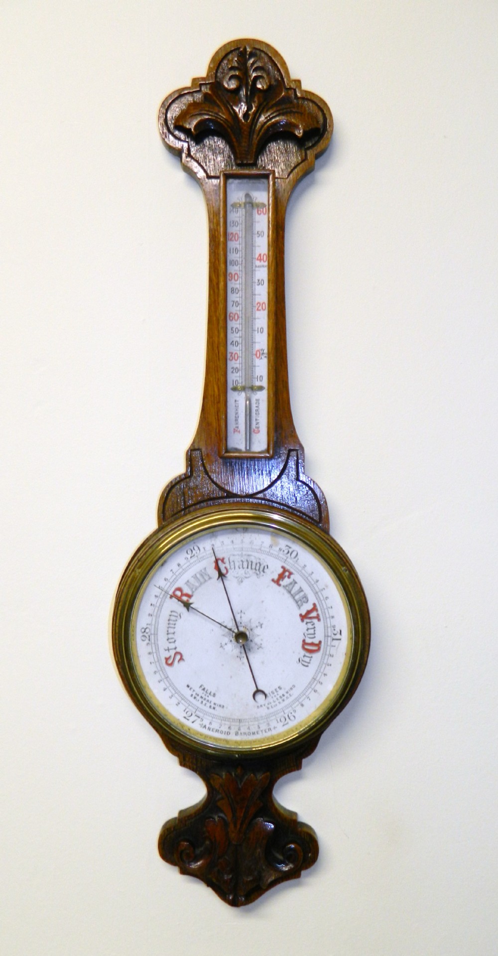 carved oak barometer