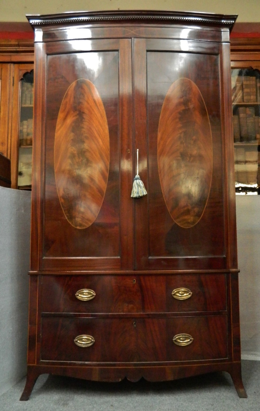 mahogany bow front linen press