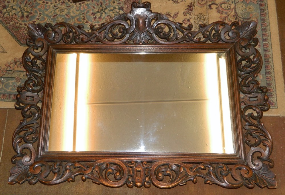 large carved oak mirror