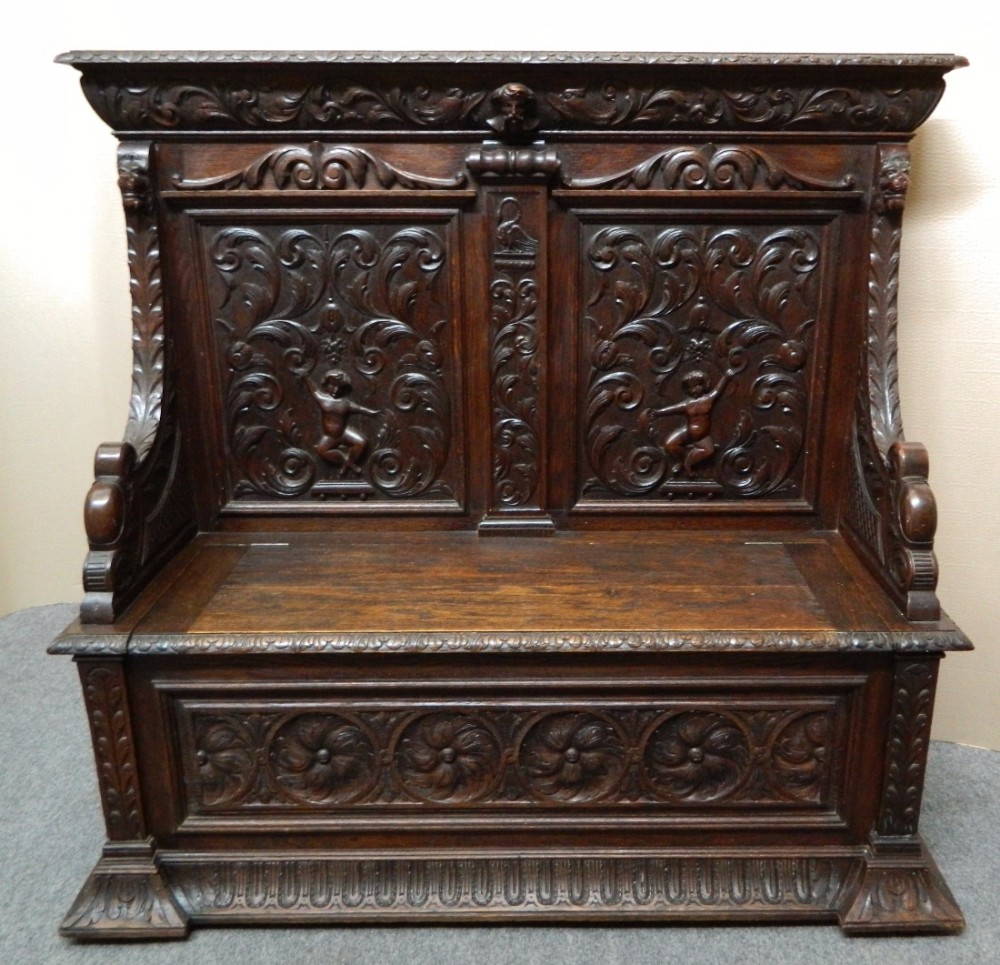 carved oak settle bench