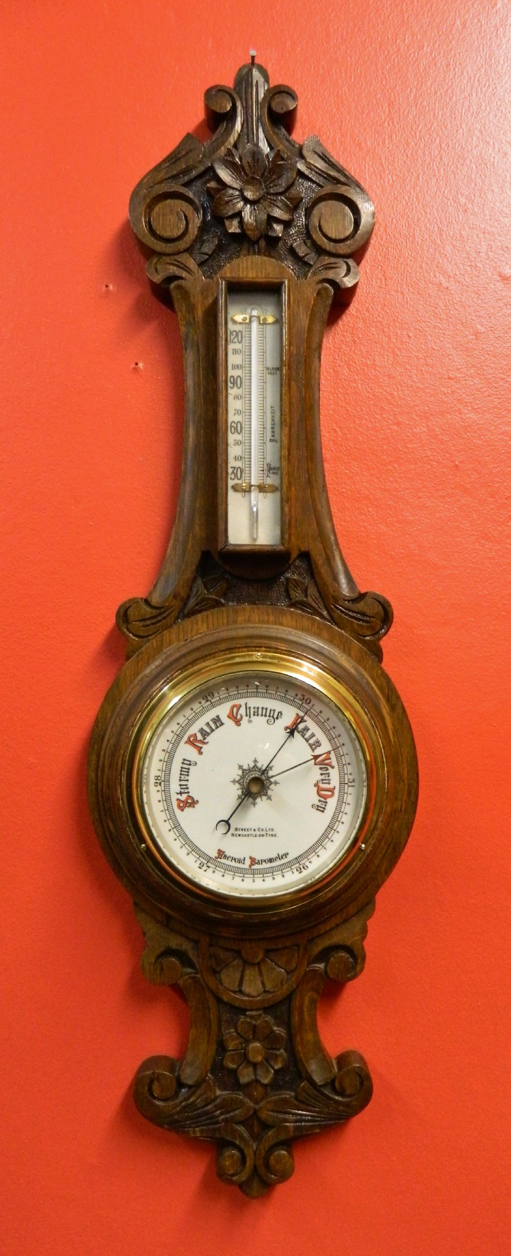 carved oak barometer