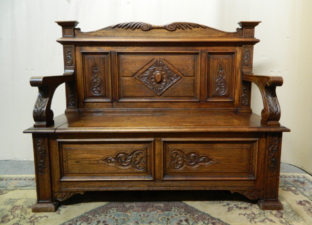 carved oak settle