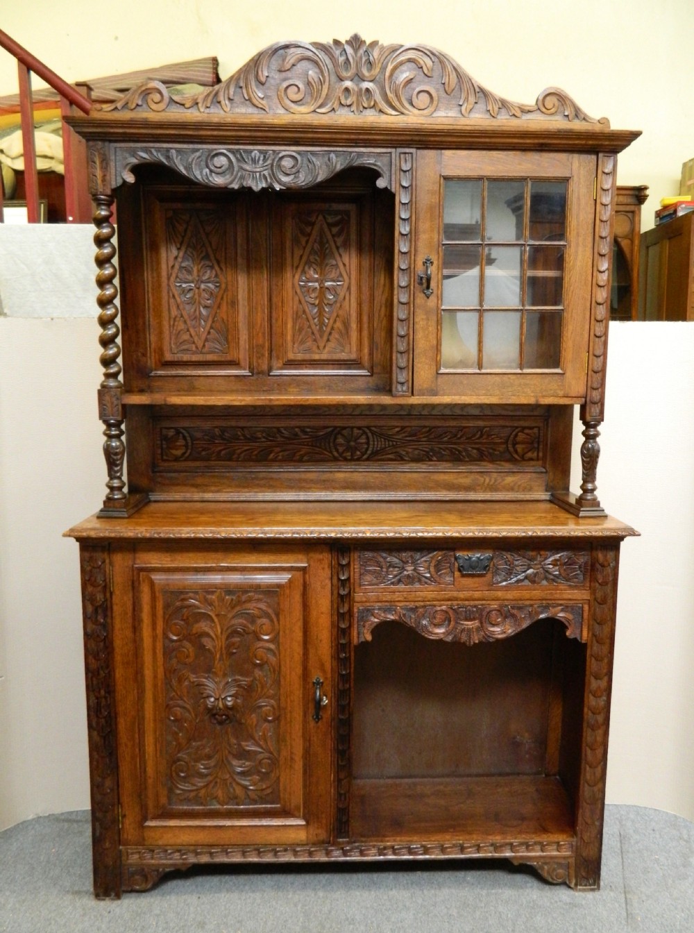 carved oak green man sideboard