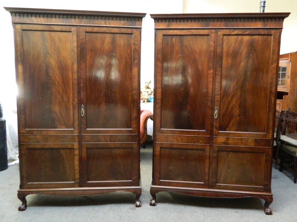 pair of mahogany wardrobes