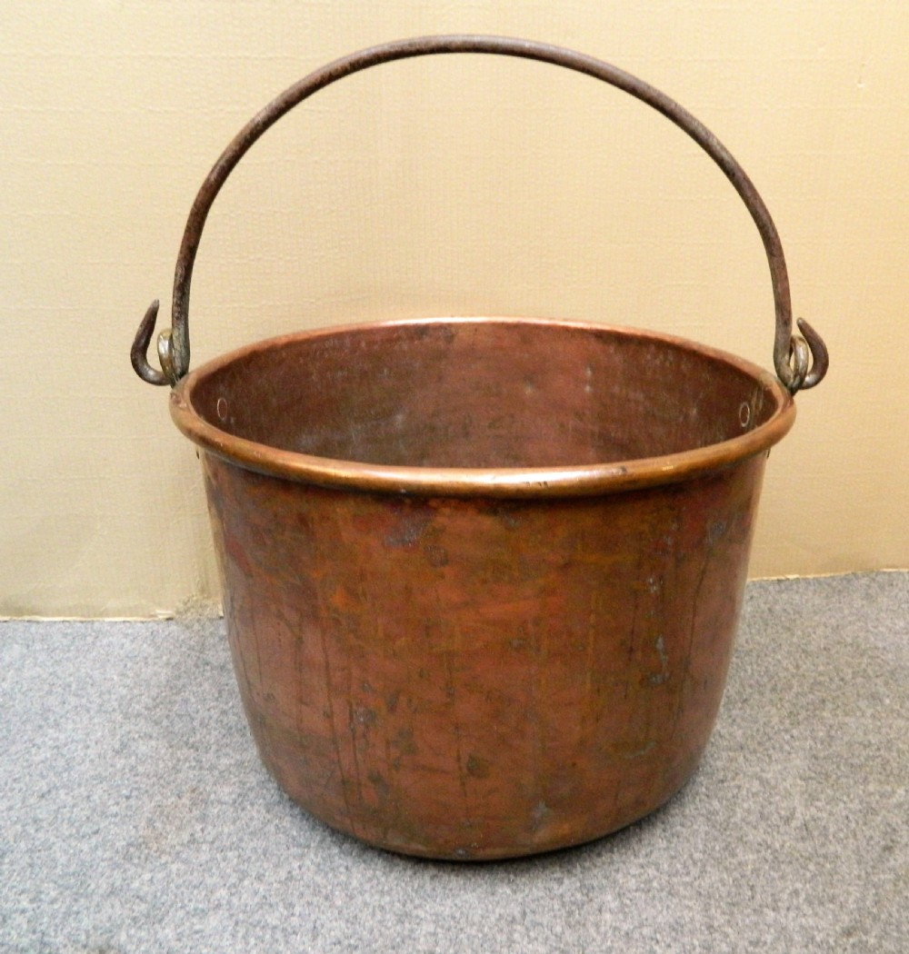 large copper pot log bin