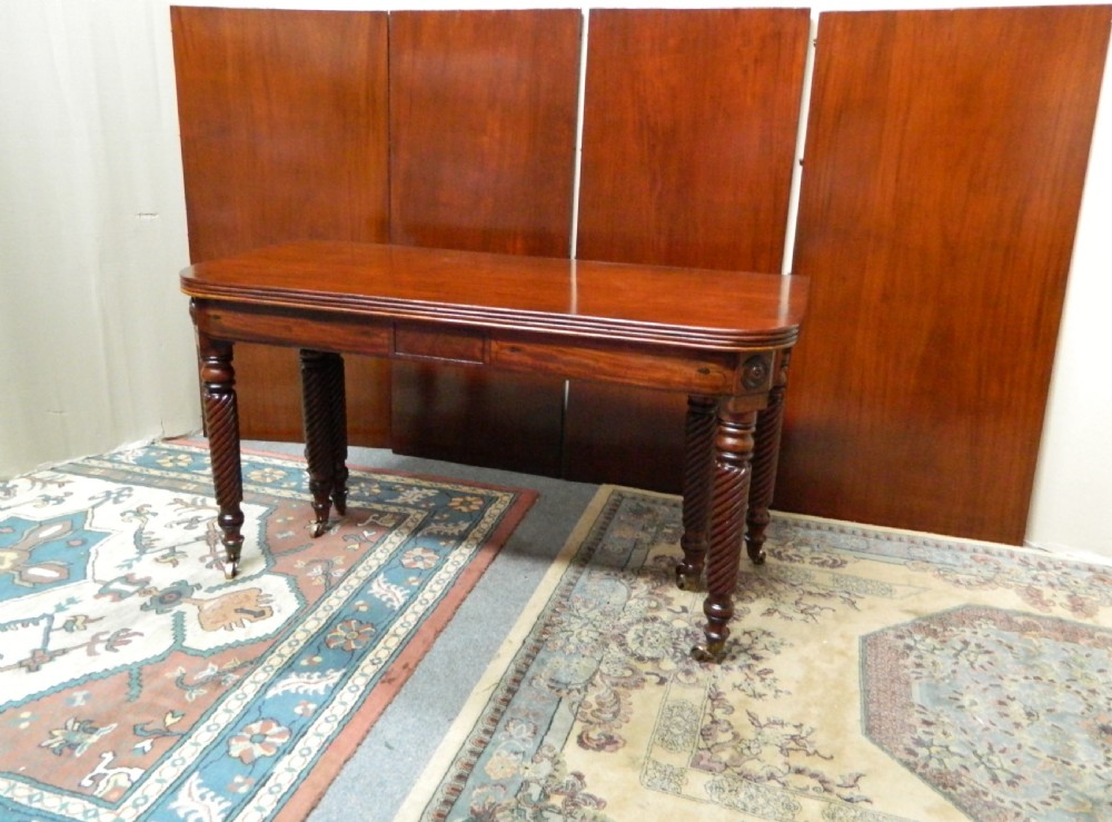 large regency mahogany concertina action dining table