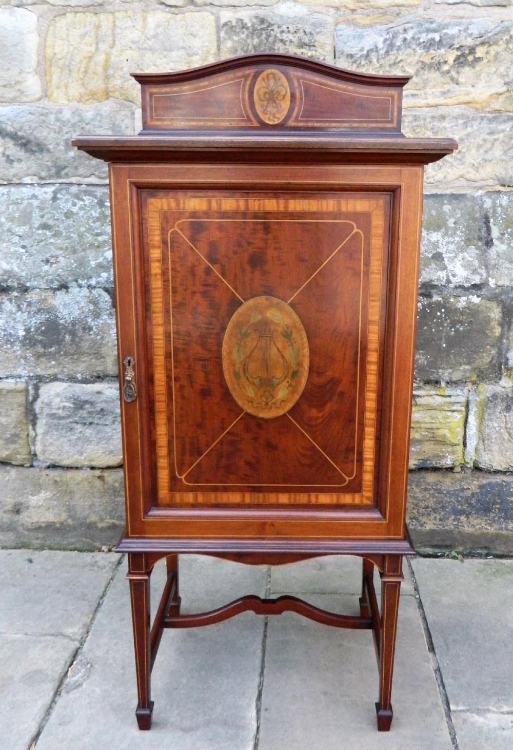 mahogany inlaid music cabinet