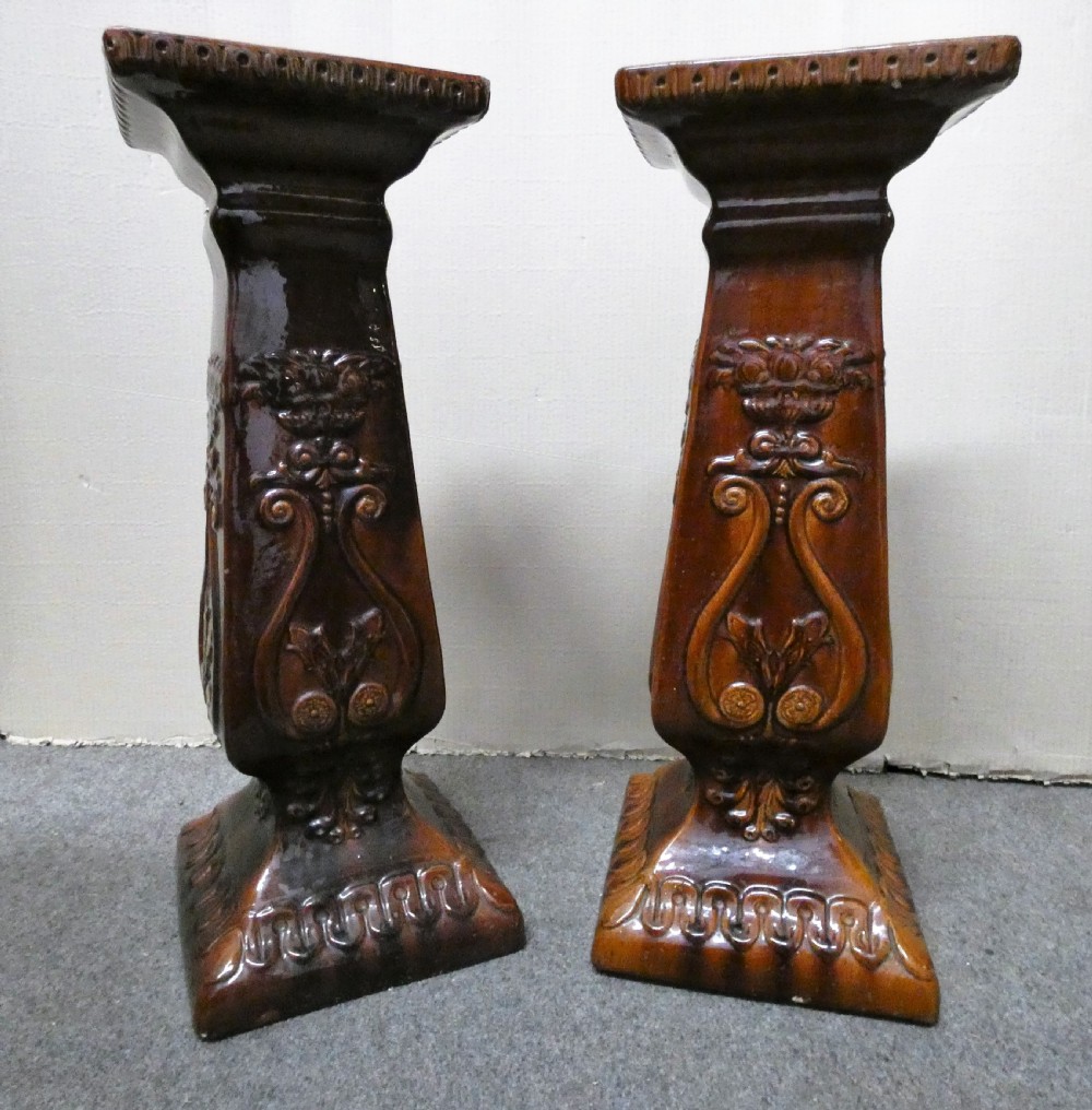 pair of arts crafts pottery jardinire plant stands