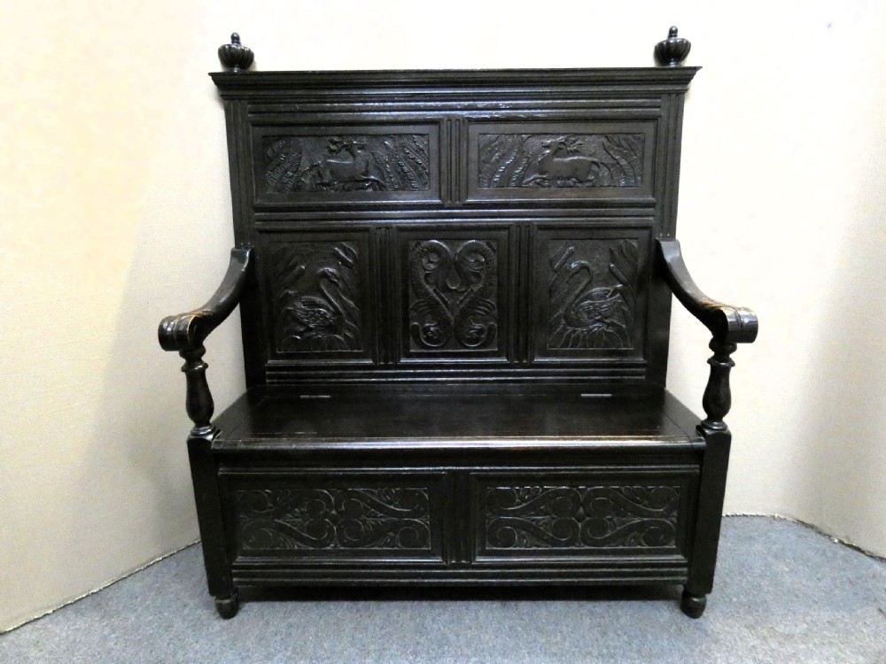 carved oak settle