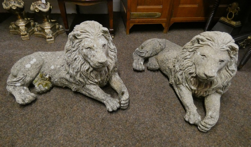 two lion garden statues